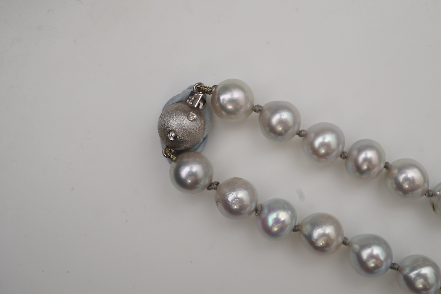 A cultured pearl and diamond necklace